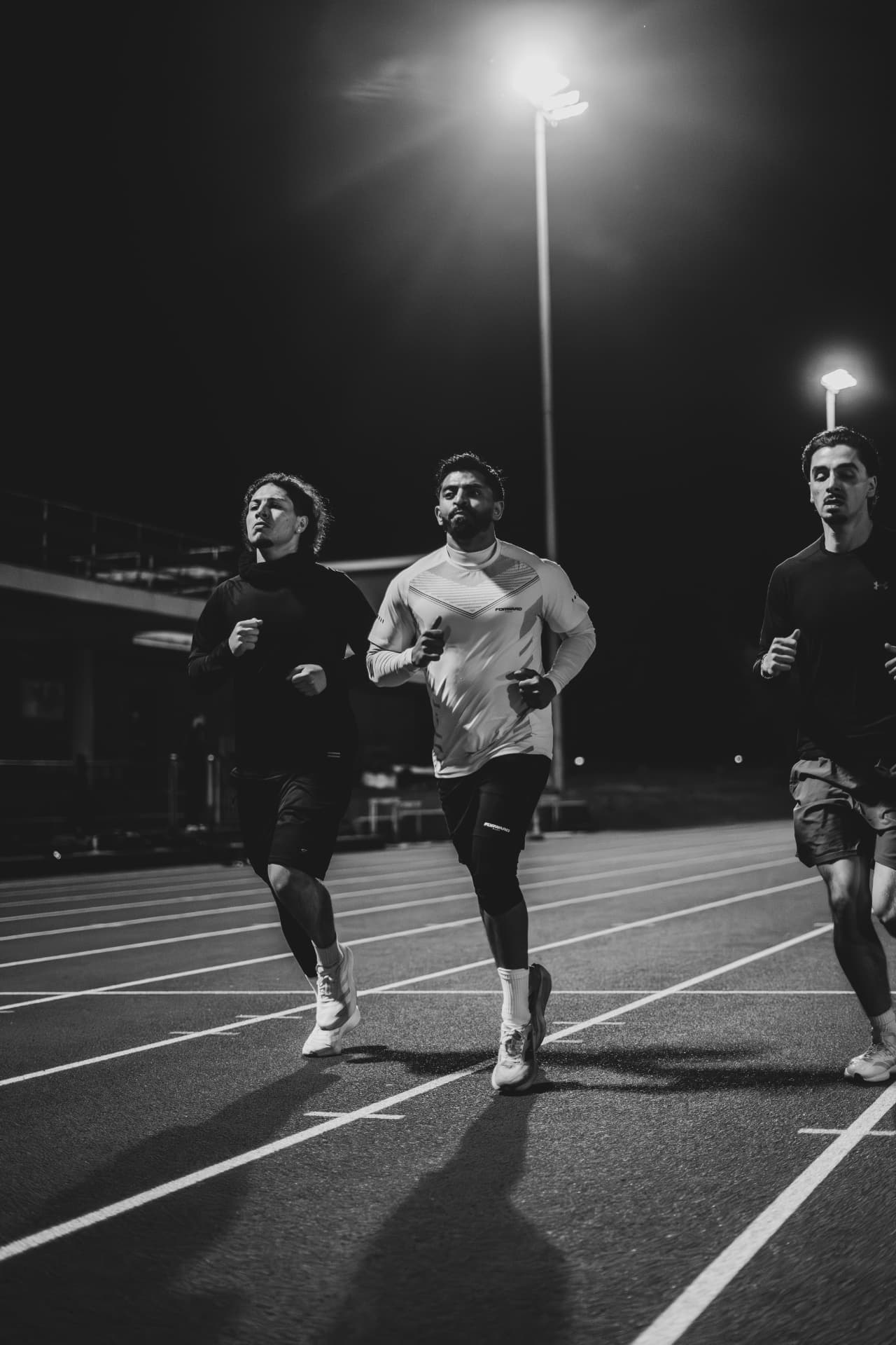 Group night run under the floodlights