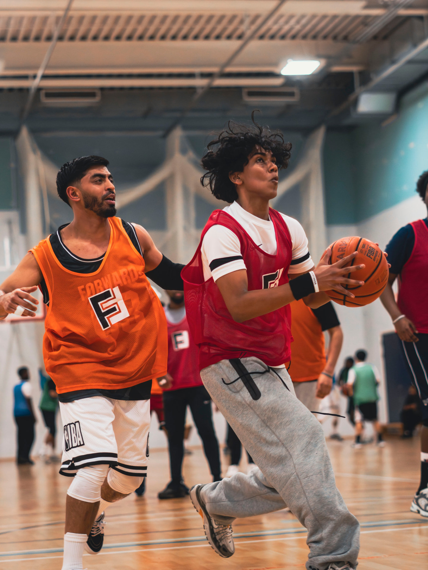 Two players driving to the basket