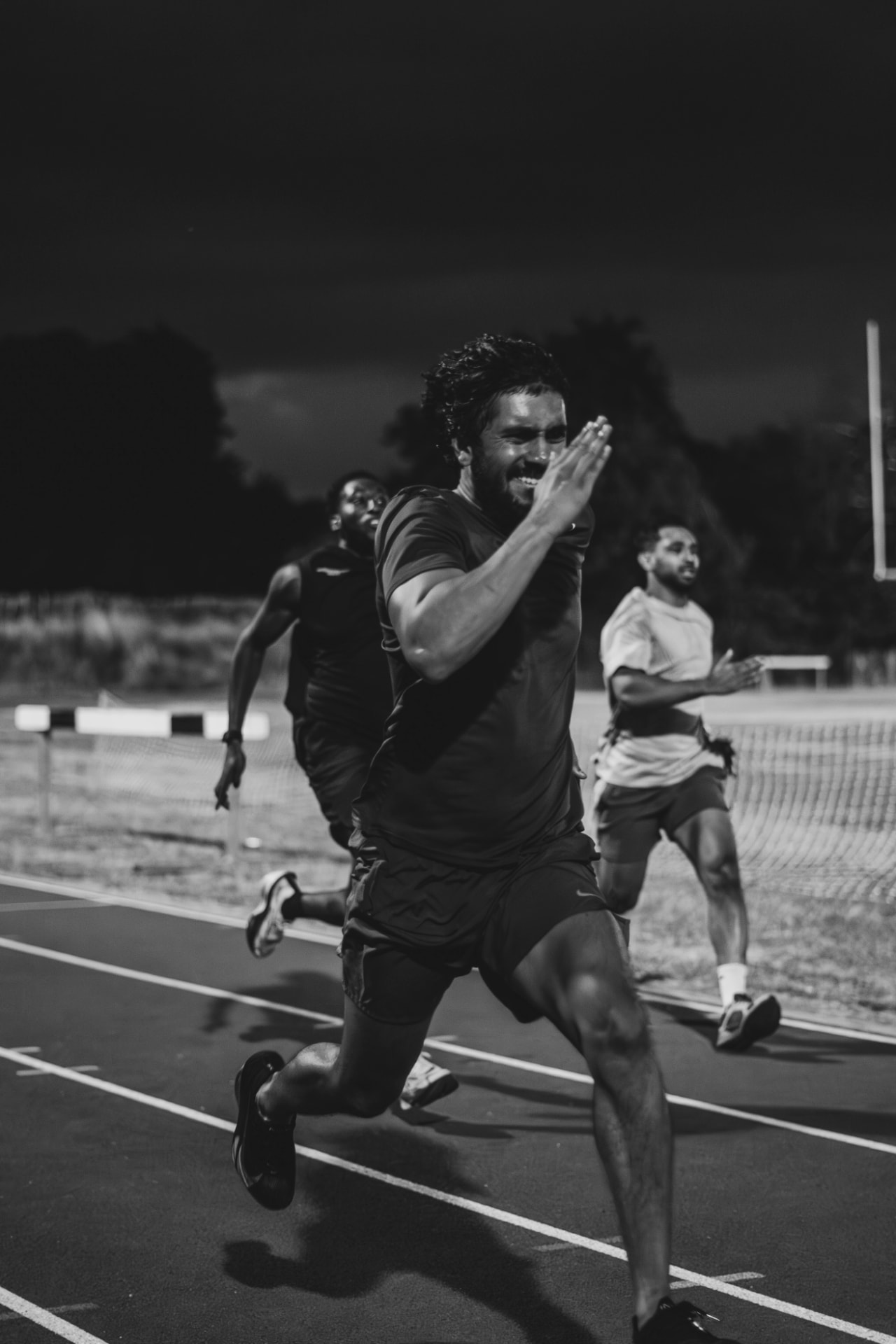 Forward Fitness members sprinting on the running track